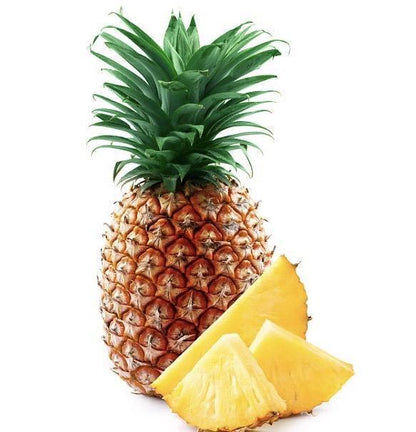 Fresh whole pineapple with two pineapple slices, organic dried fruit for Spice n Slice Market.