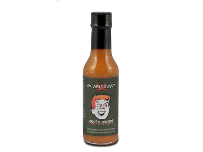 Angry Ginger habanero hot sauce bottle with cartoon face label on white background