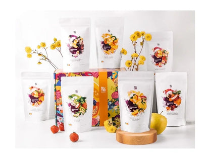 NutriBoom freeze-dried smoothie pouches with fruit, colorful box, and yellow flowers