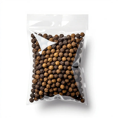 Clear resealable plastic bag filled with mixed black and brown peppercorns on white background
