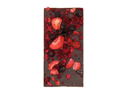 Dark chocolate bar topped with freeze-dried strawberries and blueberries