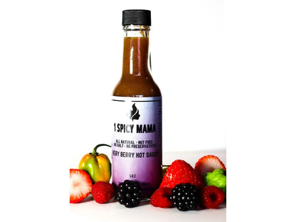 1 Spicy Mama Very Berry Hot Sauce bottle with fresh berries and peppers on white background