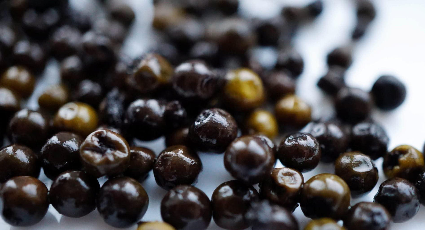 Black Kampot pepper (piper nigrum) from our own farm in Cambodia in a
