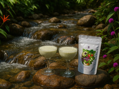 Green smoothie powder packet and two glasses on rocks by a forest stream, fresh natural setting