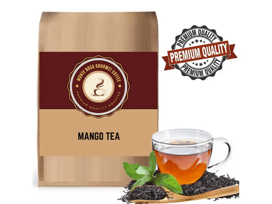 Monte Rosa Gourmet Coffee mango tea bag with glass cup of tea, green leaf, and premium quality badge